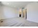 Spacious bedroom featuring soft carpet, recessed lighting, and ensuite bathroom access at 1974 S Haleyville Way, Aurora, CO 80018