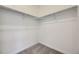 Walk in closet featuring carpet and bars for optimal storage at 1974 S Haleyville Way, Aurora, CO 80018