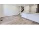 Bright living area featuring stylish floors, and staircase leading to upper level at 1974 S Haleyville Way, Aurora, CO 80018