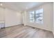 Inviting open living area with large windows that allows ample natural light at 1974 S Haleyville Way, Aurora, CO 80018