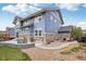 Charming two-story home showcasing a stone and siding exterior, perfect for Gathering living at 26404 E Caley Dr, Aurora, CO 80016