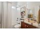 Cozy bathroom features tub, shower, and marble countertops at 26404 E Caley Dr, Aurora, CO 80016