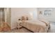 Cozy bedroom with neutral tones, complemented by stylish side tables and soft lighting at 26404 E Caley Dr, Aurora, CO 80016