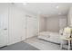 Well-lit bedroom with built-in closet and neutral carpet at 26404 E Caley Dr, Aurora, CO 80016