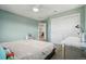 Bright bedroom featuring fresh paint, closet, and lots of sunlight at 26404 E Caley Dr, Aurora, CO 80016
