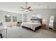 Spacious main bedroom with ample natural light and vaulted ceilings at 26404 E Caley Dr, Aurora, CO 80016