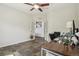 Bright and spacious home office with neutral walls and views to the entry stairs at 26404 E Caley Dr, Aurora, CO 80016
