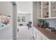 ' play area with built in shelving, game tables, and wall art at 26404 E Caley Dr, Aurora, CO 80016