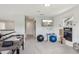 Bright playroom featuring foosball table, play area, and lots of natural light at 26404 E Caley Dr, Aurora, CO 80016