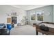 Bright playroom filled with games, toys, and natural light at 26404 E Caley Dr, Aurora, CO 80016