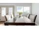 Bright dining room featuring neutral decor, natural light, and a stylish table setup perfect for Gathering meals at 1451 S Quitman St, Denver, CO 80219
