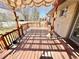Cozy back deck perfect for outdoor seating and enjoying the sunshine at 4060 Shaw Blvd, Westminster, CO 80031
