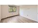 Bedroom with natural light and wood-look flooring at 1008 N Corona St # 403, Denver, CO 80218