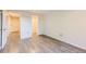 Bedroom featuring wood-look flooring and closet at 1008 N Corona St # 403, Denver, CO 80218