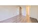 Bedroom featuring wood-look flooring and closet at 1008 N Corona St # 403, Denver, CO 80218