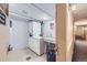 Bright laundry room featuring stacked washer and dryer units at 1008 N Corona St # 403, Denver, CO 80218
