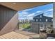 Relaxing balcony space overlooking the lush green common area and surrounding townhomes at 1764 Peak Loop, Broomfield, CO 80023
