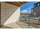 Outdoor balcony overlooking the community with stone facade at 1764 Peak Loop, Broomfield, CO 80023