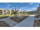 Community exterior showcasing sidewalks, benches, and landscaping at 1764 Peak Loop, Broomfield, CO 80023