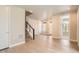 Bright entryway featuring stairs and hardwood floors at 1764 Peak Loop, Broomfield, CO 80023