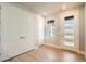 Inviting entryway featuring wood floors, closet, and a modern front door at 1764 Peak Loop, Broomfield, CO 80023