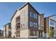 Multi-story townhome featuring private balconies and a stylish, contemporary design at 1764 Peak Loop, Broomfield, CO 80023