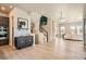 Bright living area featuring modern decor and stairs leading to the second floor at 1764 Peak Loop, Broomfield, CO 80023
