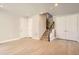 Bright living room features stairs and hardwood floors at 1764 Peak Loop, Broomfield, CO 80023
