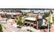 Aerial view showcases the vibrant community of Stapleton, featuring modern architecture and inviting public spaces at 6654 Pecos St, Denver, CO 80221