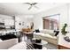 Open-concept living area with lots of natural light, modern decor, and seamless flow at 6654 Pecos St, Denver, CO 80221