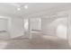 Expansive basement with carpet flooring, columns, and recessed lighting, perfect for a home theater or game room at 3190 S Detroit St, Denver, CO 80210