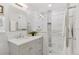 Modern bathroom with stylish vanity, tiled shower, and sleek fixtures at 3190 S Detroit St, Denver, CO 80210