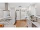 Spacious kitchen with granite countertops, stainless steel appliances, and ample storage at 3190 S Detroit St, Denver, CO 80210