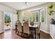 Cozy dining area featuring a table with seating and an outdoor view at 860 Quintana Ln, Erie, CO 80516
