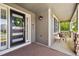 Inviting front porch with a stylish door, a wreath, seating, and a cozy space for relaxation and enjoying the outdoors at 860 Quintana Ln, Erie, CO 80516