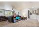 Upstairs living room with TV and bookshelf at 860 Quintana Ln, Erie, CO 80516