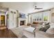 Inviting living room featuring a cozy fireplace and stylish furniture, perfect for relaxation and entertaining at 860 Quintana Ln, Erie, CO 80516