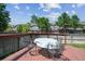 Outdoor patio with table and chairs, ideal for enjoying the fresh air and views of the community at 10223 Vine Ct, Thornton, CO 80229