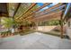 Backyard pergola with a concrete patio, wooden structure, and a view of the playset at 2999 S Adams St, Denver, CO 80210