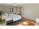 Bright bedroom features closet access and hardwood floors at 1985 Union St, Lakewood, CO 80215