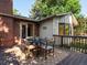Cozy back deck with outdoor dining furniture at 1985 Union St, Lakewood, CO 80215