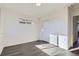 Bedroom with light gray floors, and closet with sliding doors at 10251 E 62Nd Pl, Denver, CO 80238