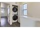 Stackable washer and dryer in laundry closet at 10251 E 62Nd Pl, Denver, CO 80238