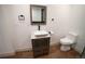 Modern bathroom featuring a square vessel sink and a stylish vanity at 14546 Pine View Rd, Larkspur, CO 80118