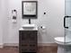 Bathroom featuring a modern vanity, vessel sink, and stylish finishes at 14546 Pine View Rd, Larkspur, CO 80118