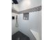 Modern walk-in shower with a tiled niche and a rain shower head at 14546 Pine View Rd, Larkspur, CO 80118