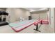 Finished basement featuring gymnastics equipment, ideal for active families or creating a recreational space at 7734 Blue Water Dr, Castle Rock, CO 80108