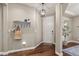 Inviting entryway with hardwood floors and stylish decor at 7734 Blue Water Dr, Castle Rock, CO 80108