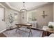 Bright office space with a desk, natural light, and neutral decor at 7734 Blue Water Dr, Castle Rock, CO 80108