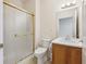 Standard bathroom with a walk-in shower with a frosted glass door at 10725 Eliot Cir # 102, Denver, CO 80234